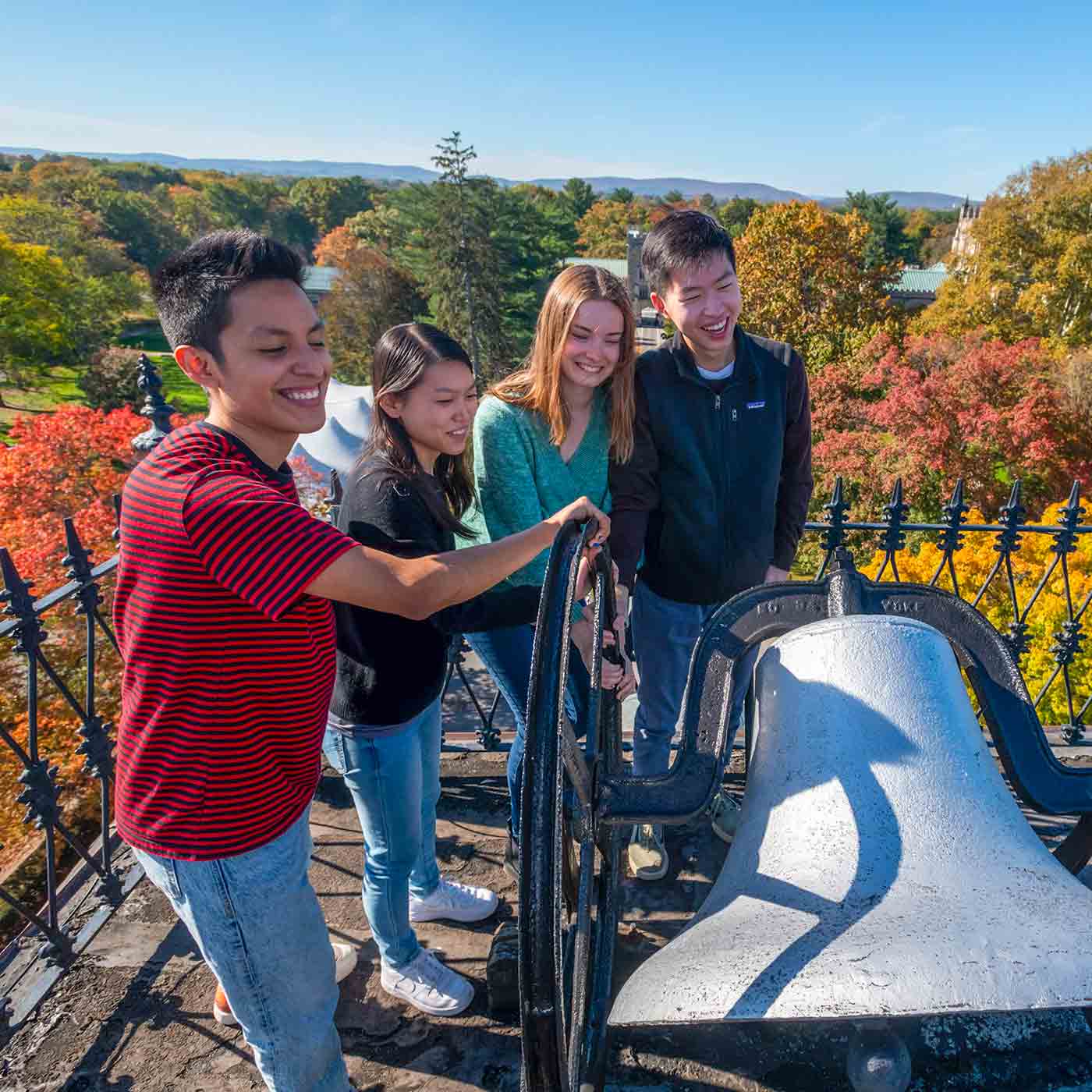 Students ringing the bell atop Vassar College Main Building