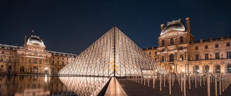 The pyramid outside the Musée du Louvre at night.
