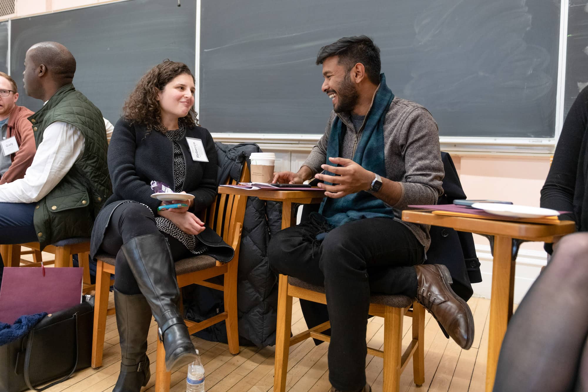 Two people sitting and talking