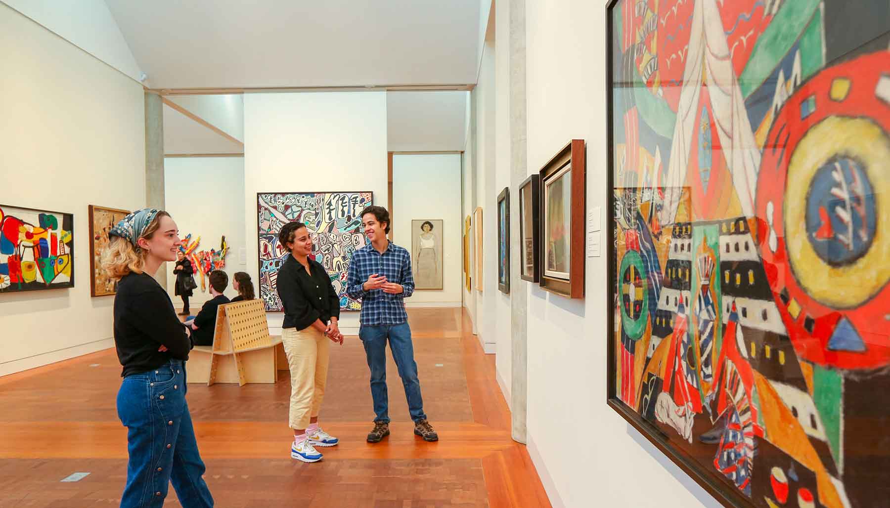 Students admire artwork in the Frances Lehman Loeb Art Center