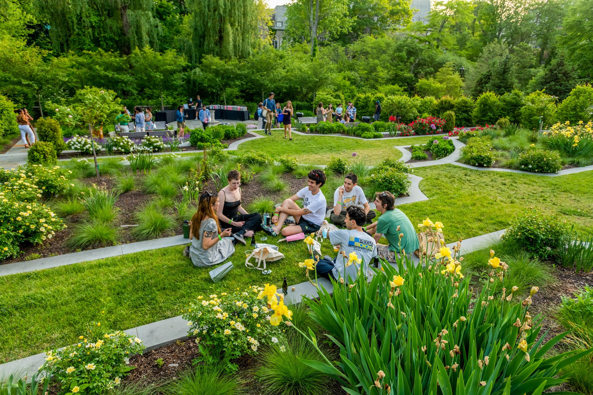 Students sitting in the Shakespeare Garden on Vassar Campus