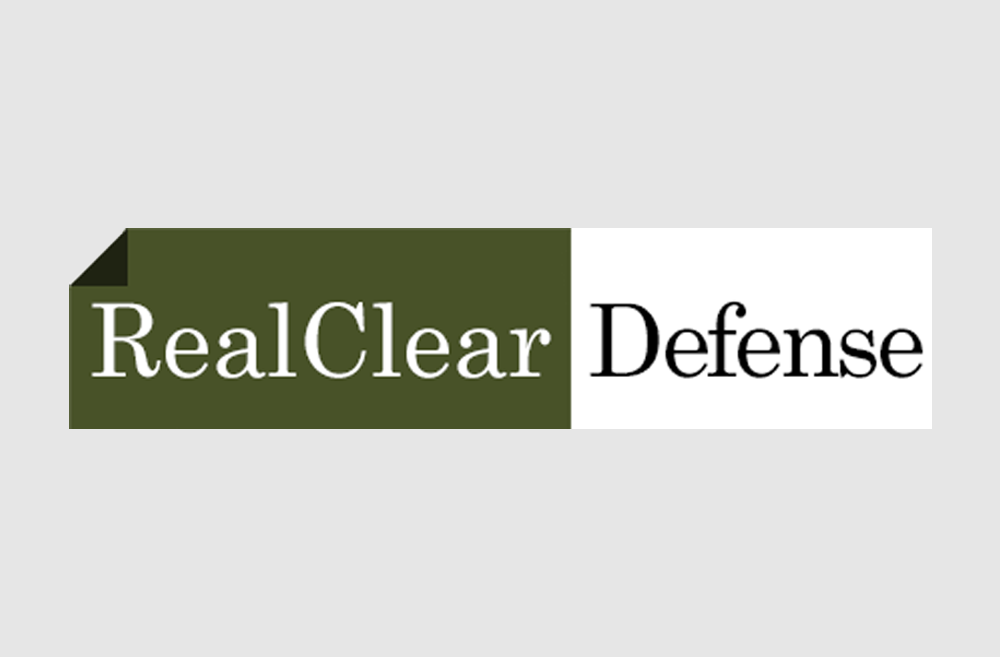 RealClear Defense logo with “RealClear” in white on a dark green block and “Defense” in black on white.