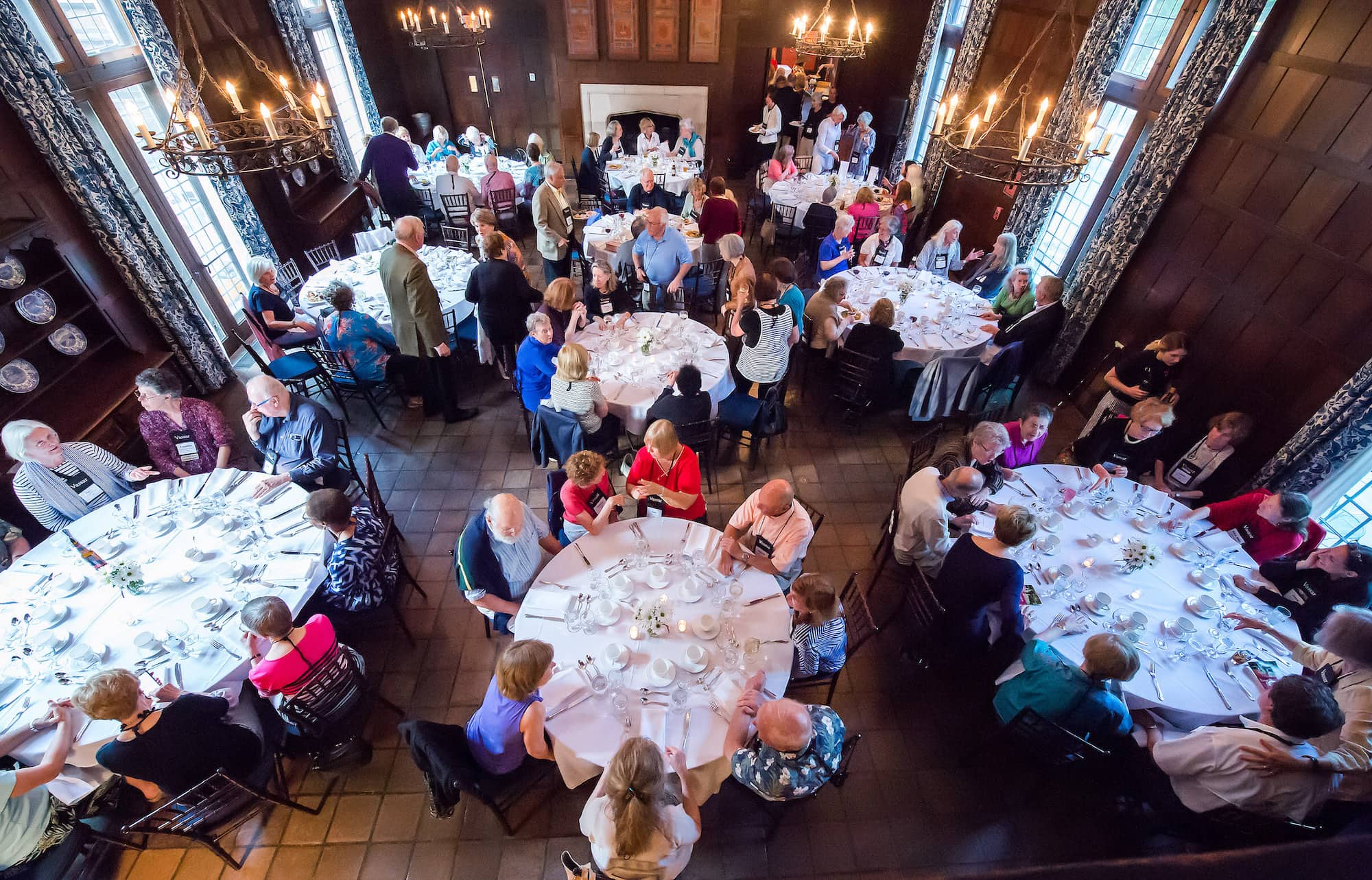 Gathering of people dining inside Alumnae House