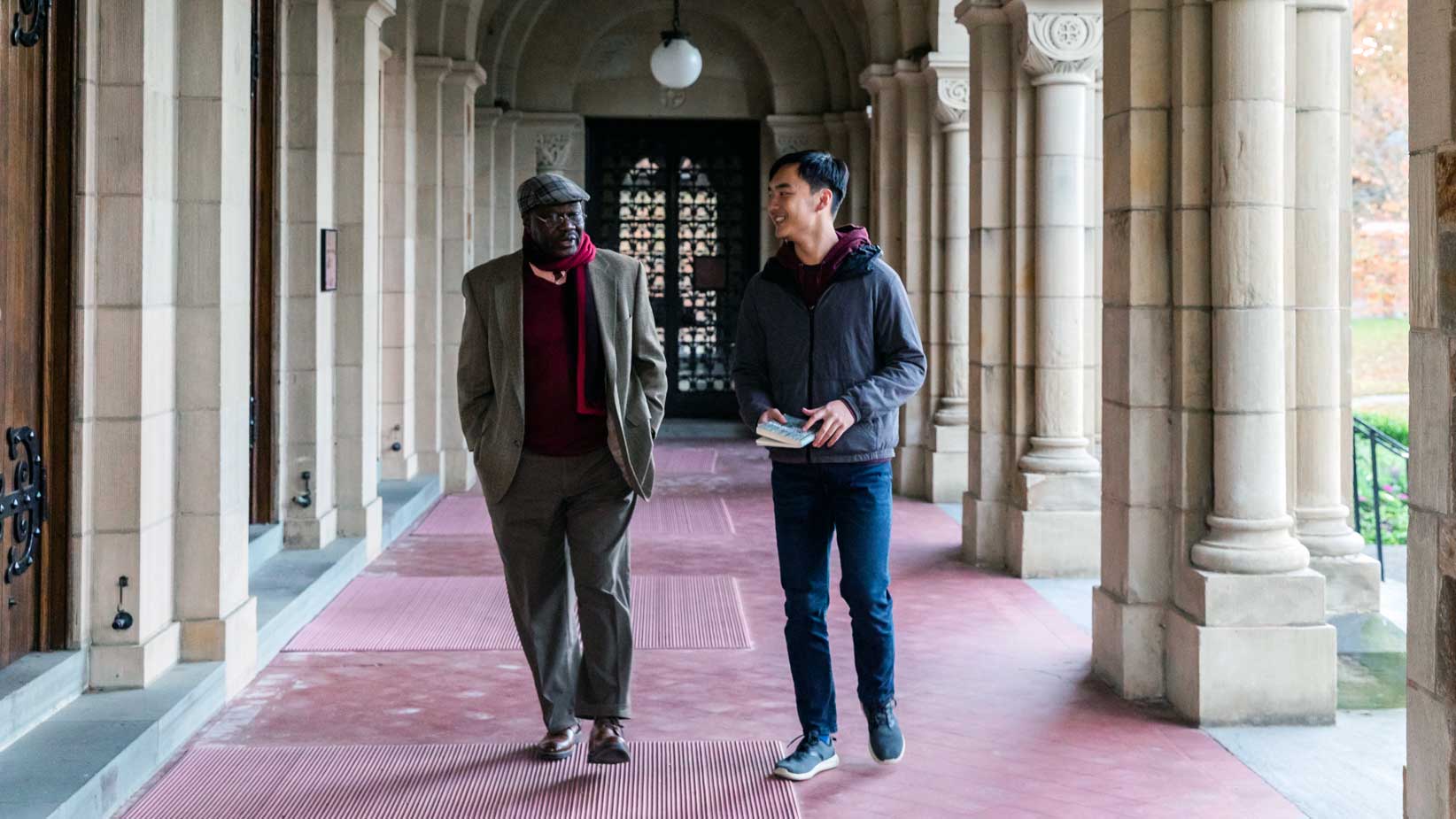 Student Walking With a professor