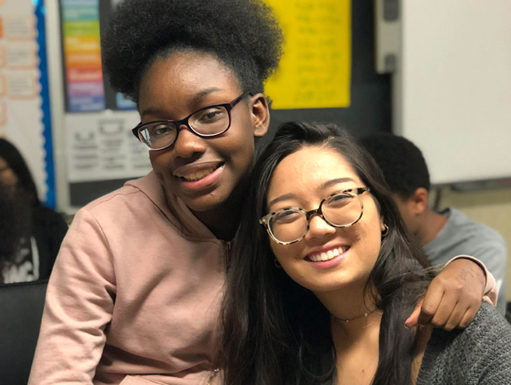 Two Students Smiling