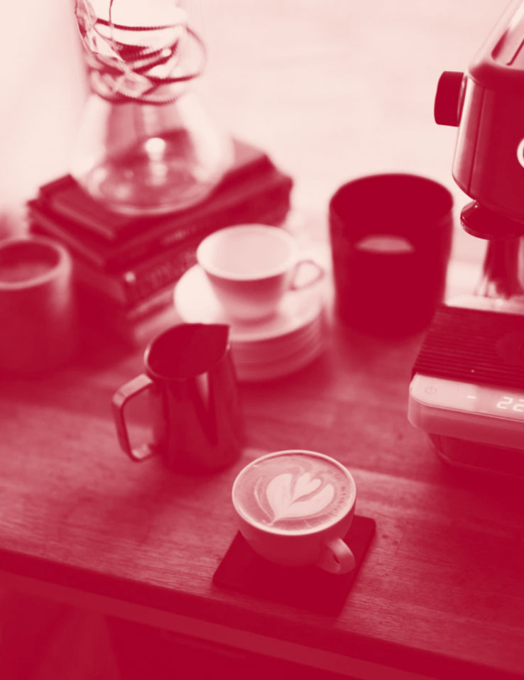 Example of a gradient map with Burgundy > Cream applied to a still life with coffee cups and carafes