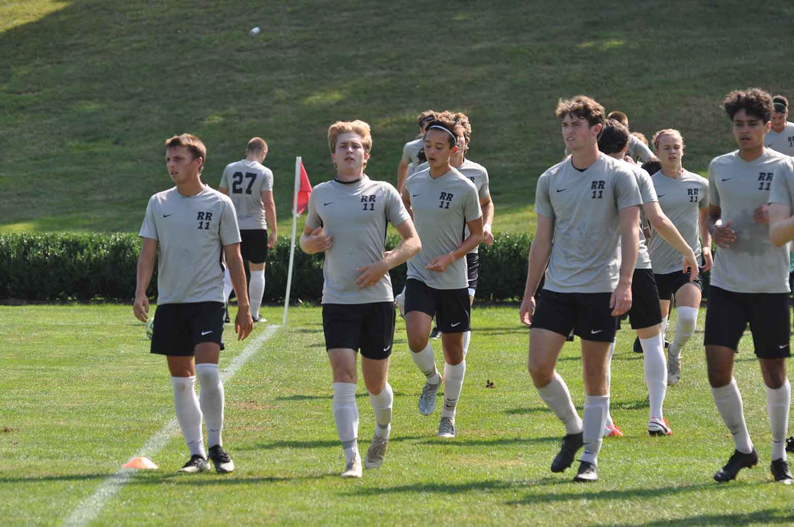 The team honors Rolfing’s legacy with practice jerseys inscribed with his initials and his uniform number, 11.