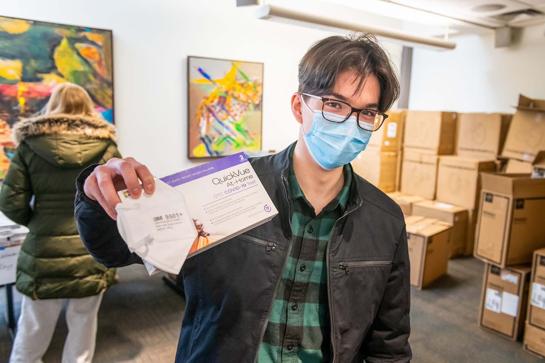 All students were issued tight-fitting KN95 masks and home COVID-19 test kits as they moved back to the campus.
