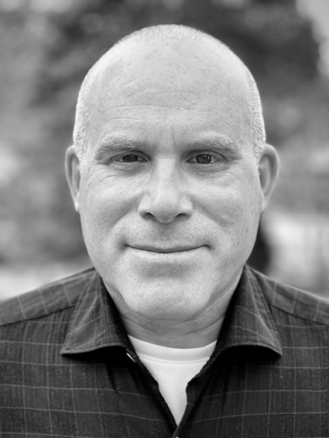 A black-and-white headshot of Jonathan Littman ’85 P’22