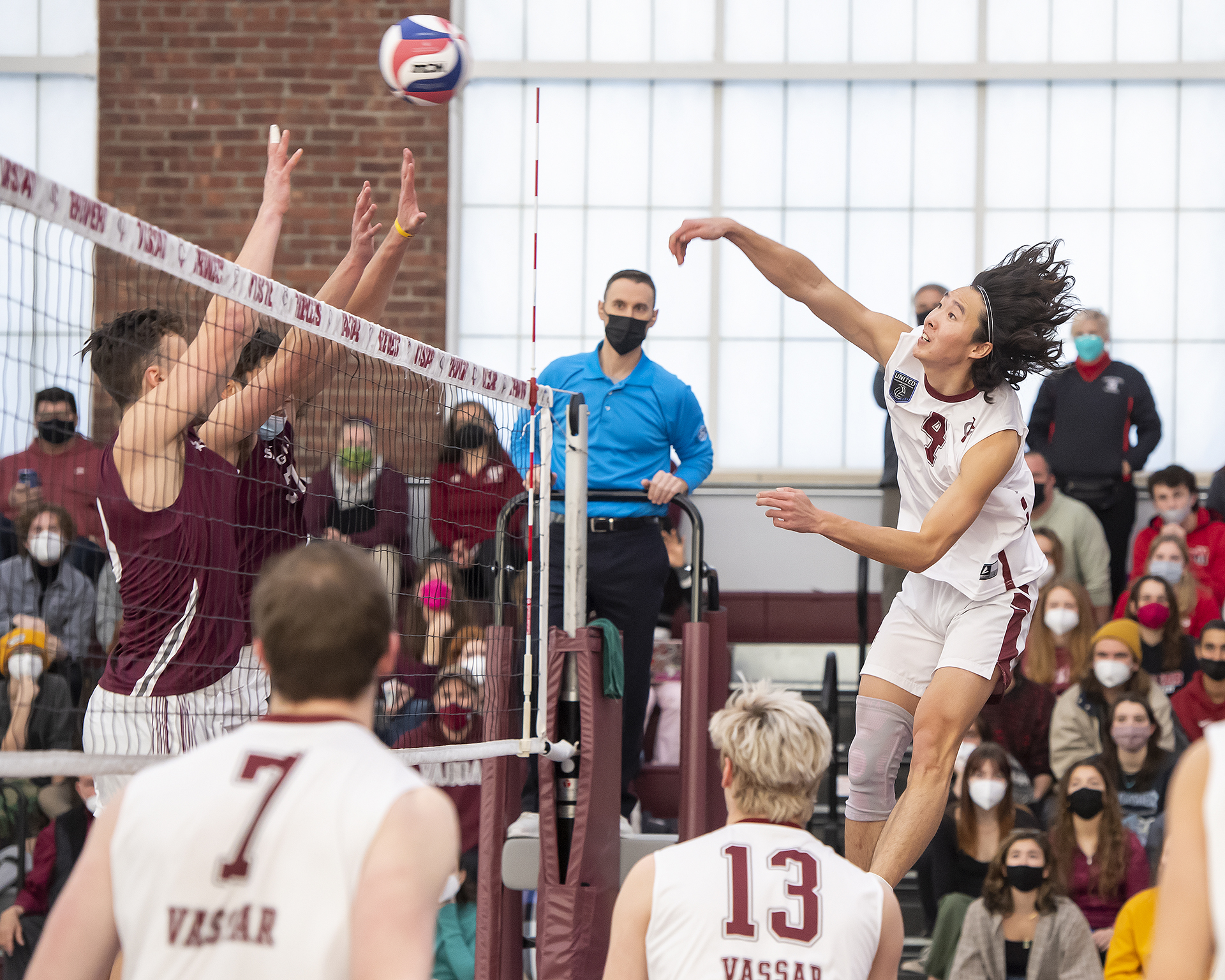 Vassar volleyball player Andrew Kim in action