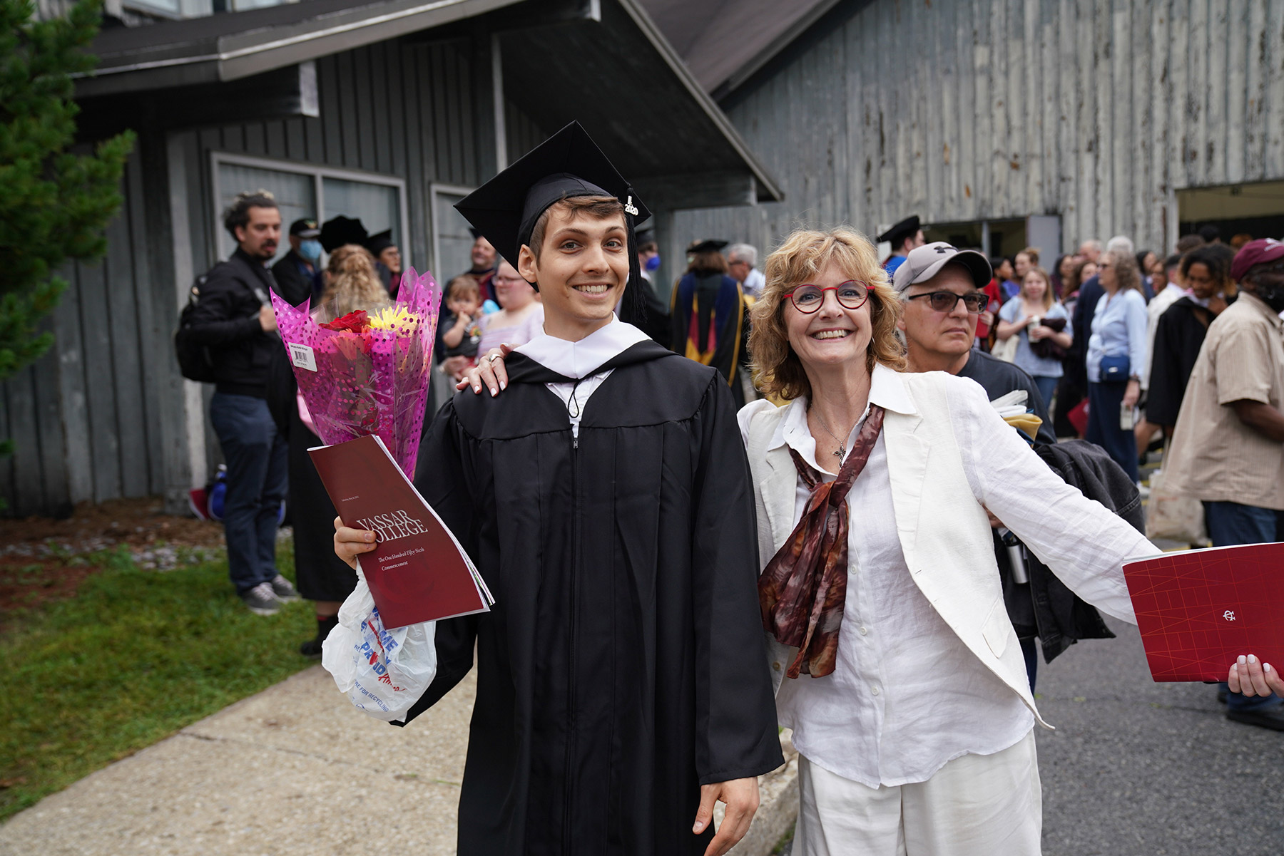A mother celebrates her graduate after the ceremony.