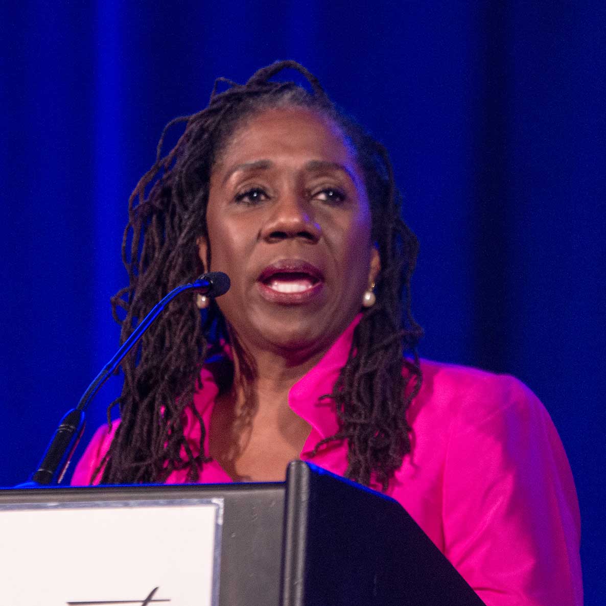 Sherrilyn Ifill speaking into a microphone