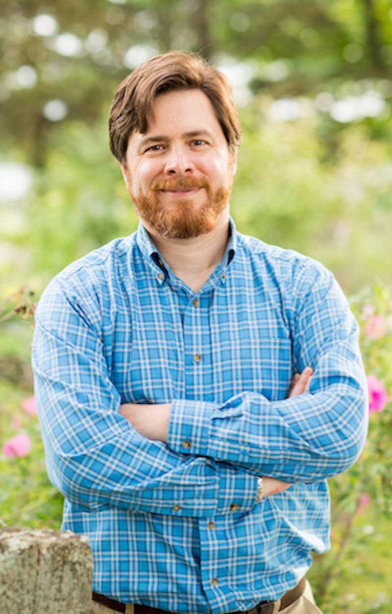 headshot of Peter Henne