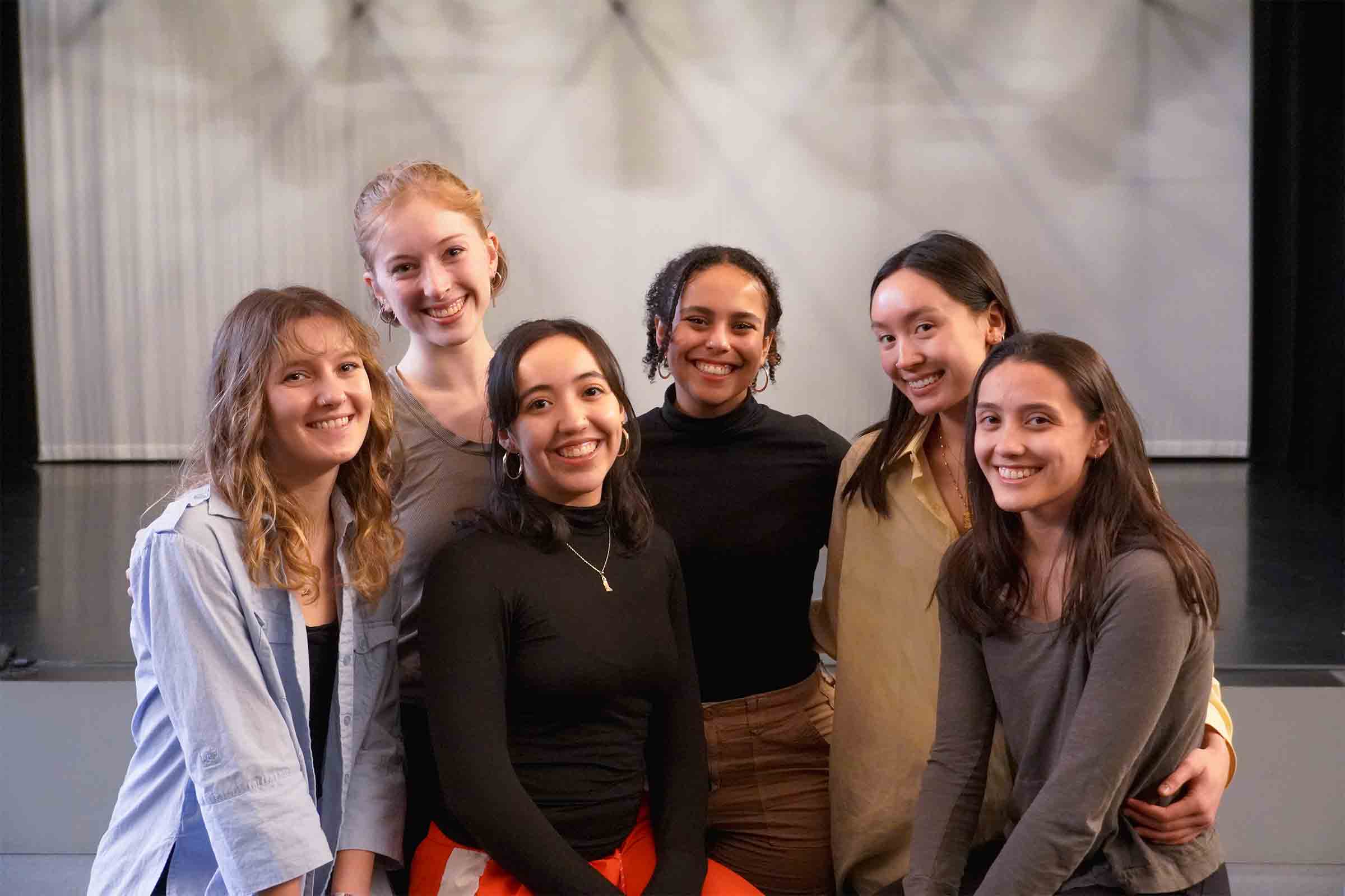 Six people stand in a room, smiling at the camera. Left to right: Grace Hall, Olivia Gotsch, Jalene Medina, Danielle Lomi, Lily Gee, and Natalie Junio-Thompson, class of 2023