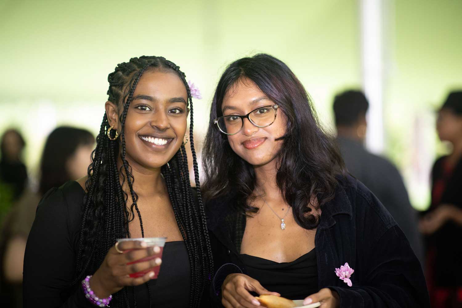 two people smiling for the camera