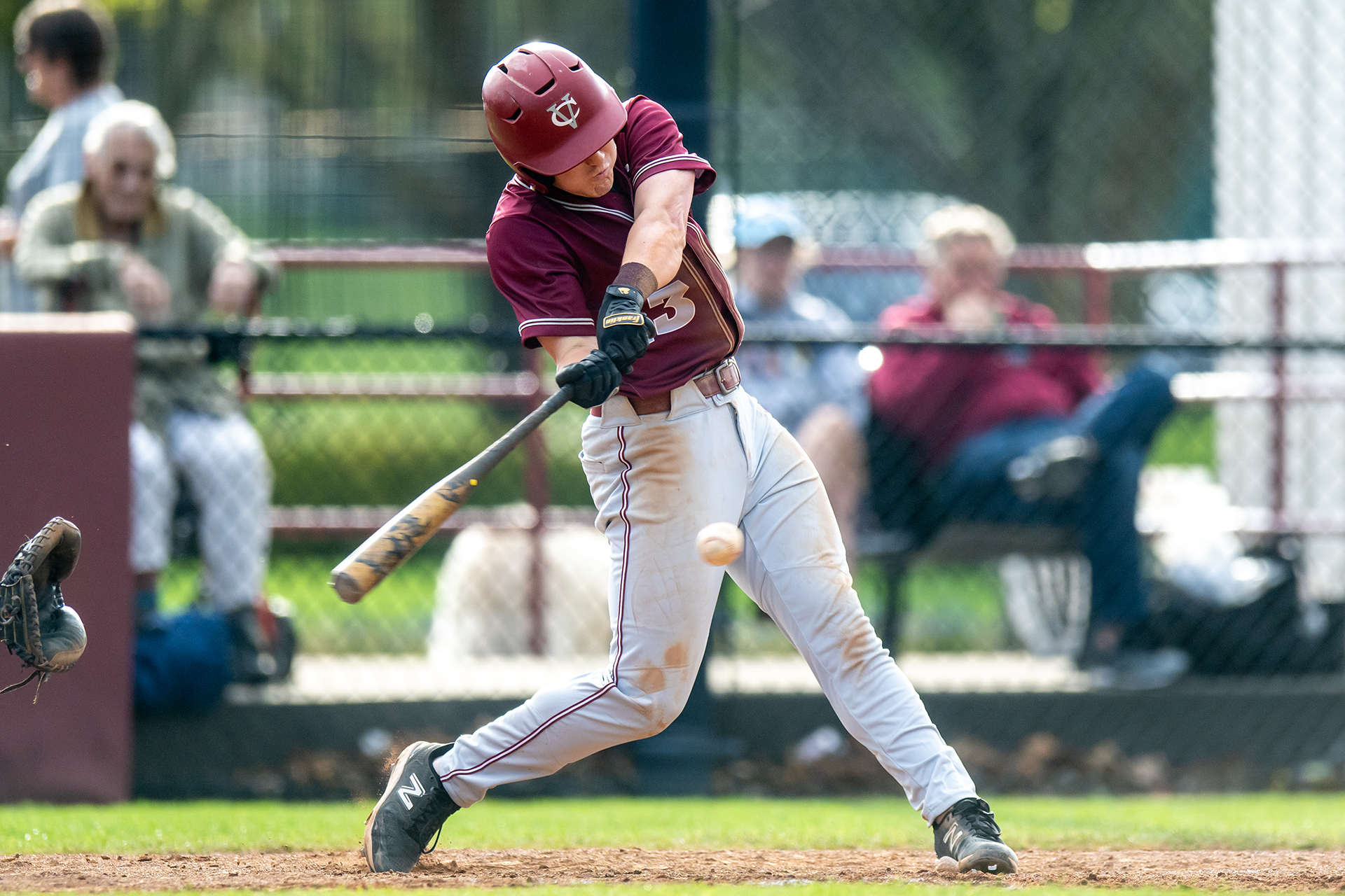 Reid Lapekas swings his bat during a game.