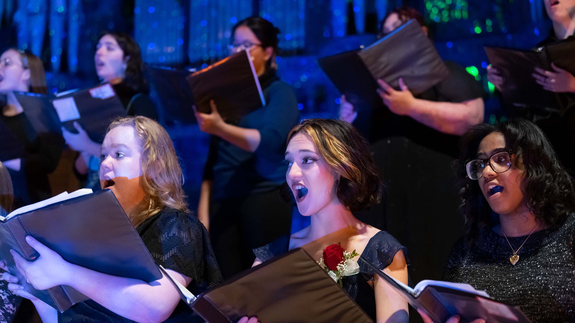 women singing in a chorus