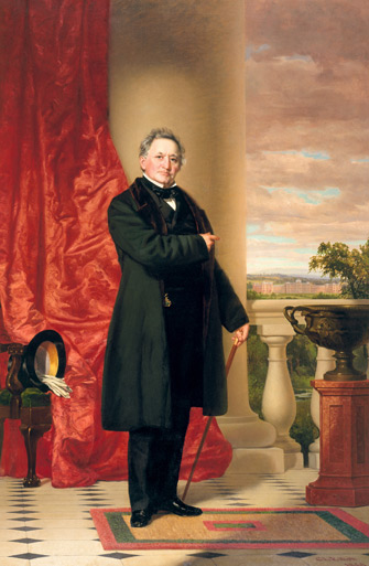 A painting of a person in 19th-century male formal wear—black coat, black pants, and a cane—standing in front of an enormous pillar and a red curtain, pointing to a large brick building in the background.