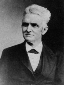 A 19th-century photo of Elias Magoon, a person with short gray hair and a formal 19th-century shirt and coat.