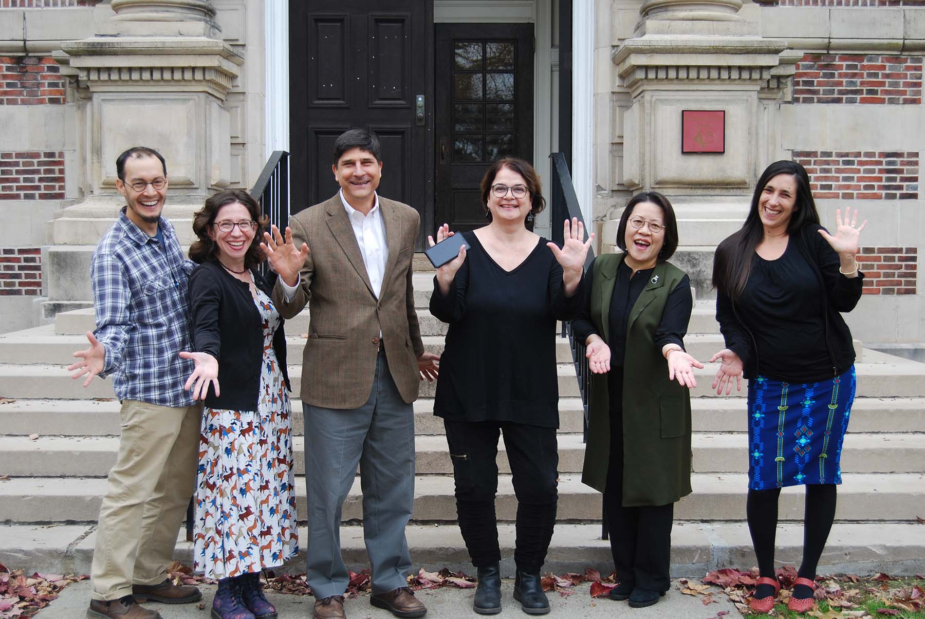 Group photo of Justin Patch, Dara Greenwood, Ron Patkus, Paulina Bren, Hiromi Dollase, Sole Anatrone standing in front of steps of a building.