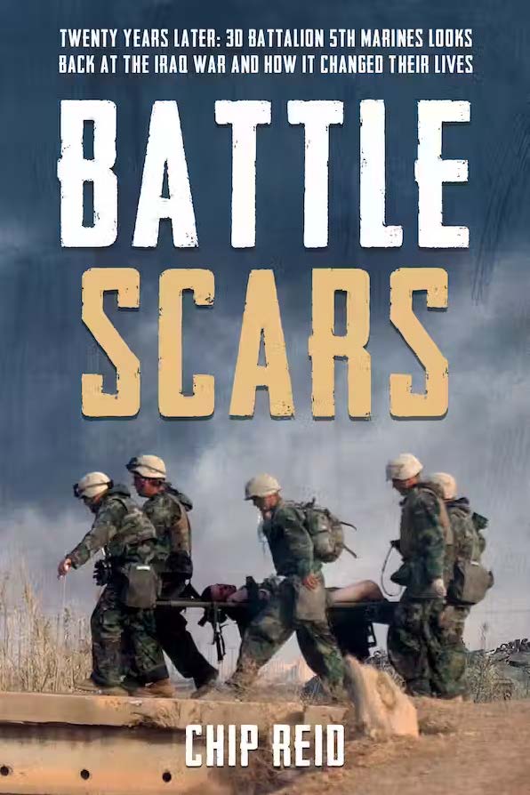 The cover of a book. The title of the book is "Battle Scars". The author is Chip Reid. The cover shows a photograph of several soldiers carrying an injured soldier in a stretcher.