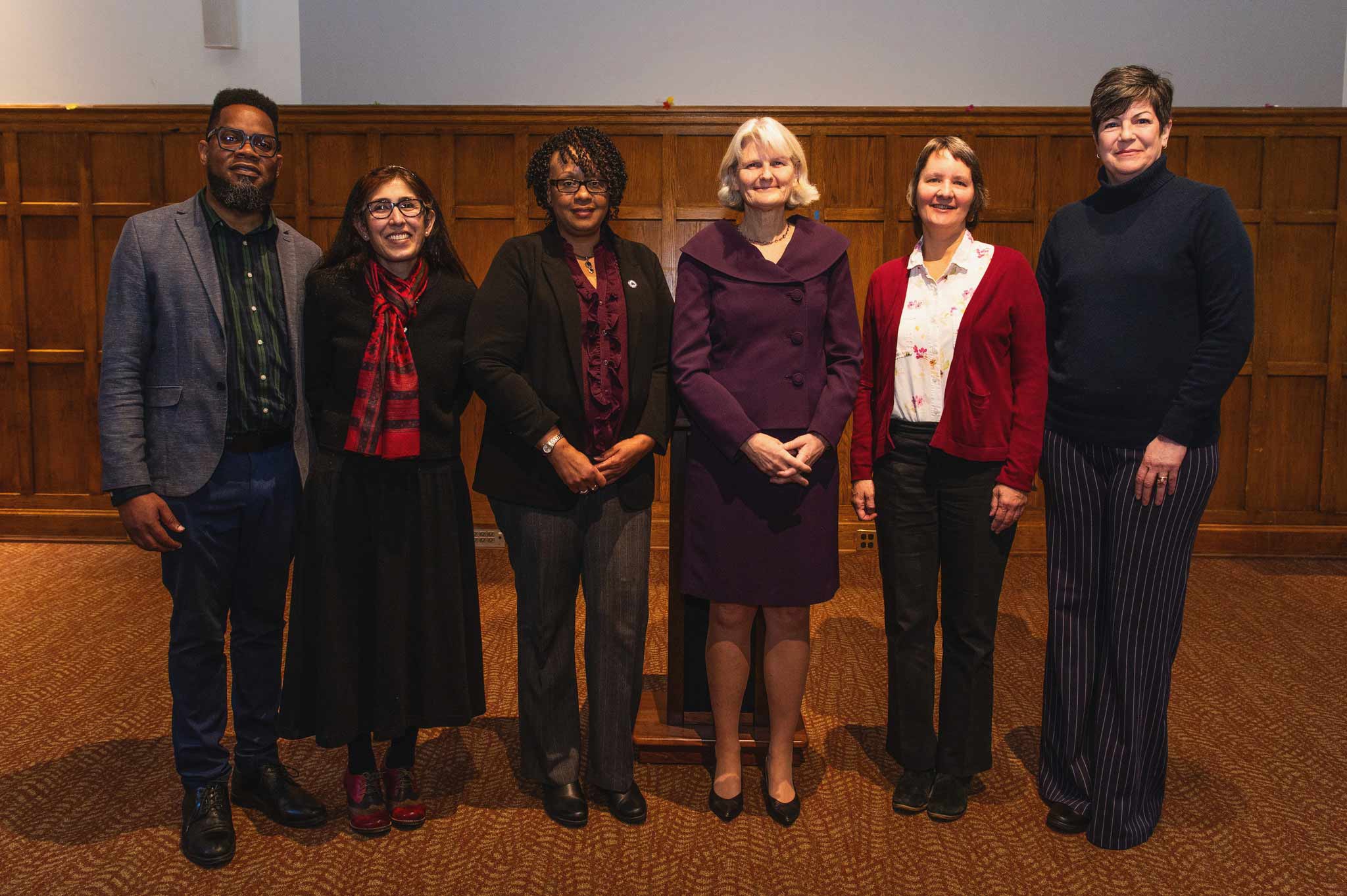 President Bradley posing with Ryan Sharpe, Lisa Kaul, Dutchess, Yvonne Flowers, Rebecca Edwards, and Barbara Laird.