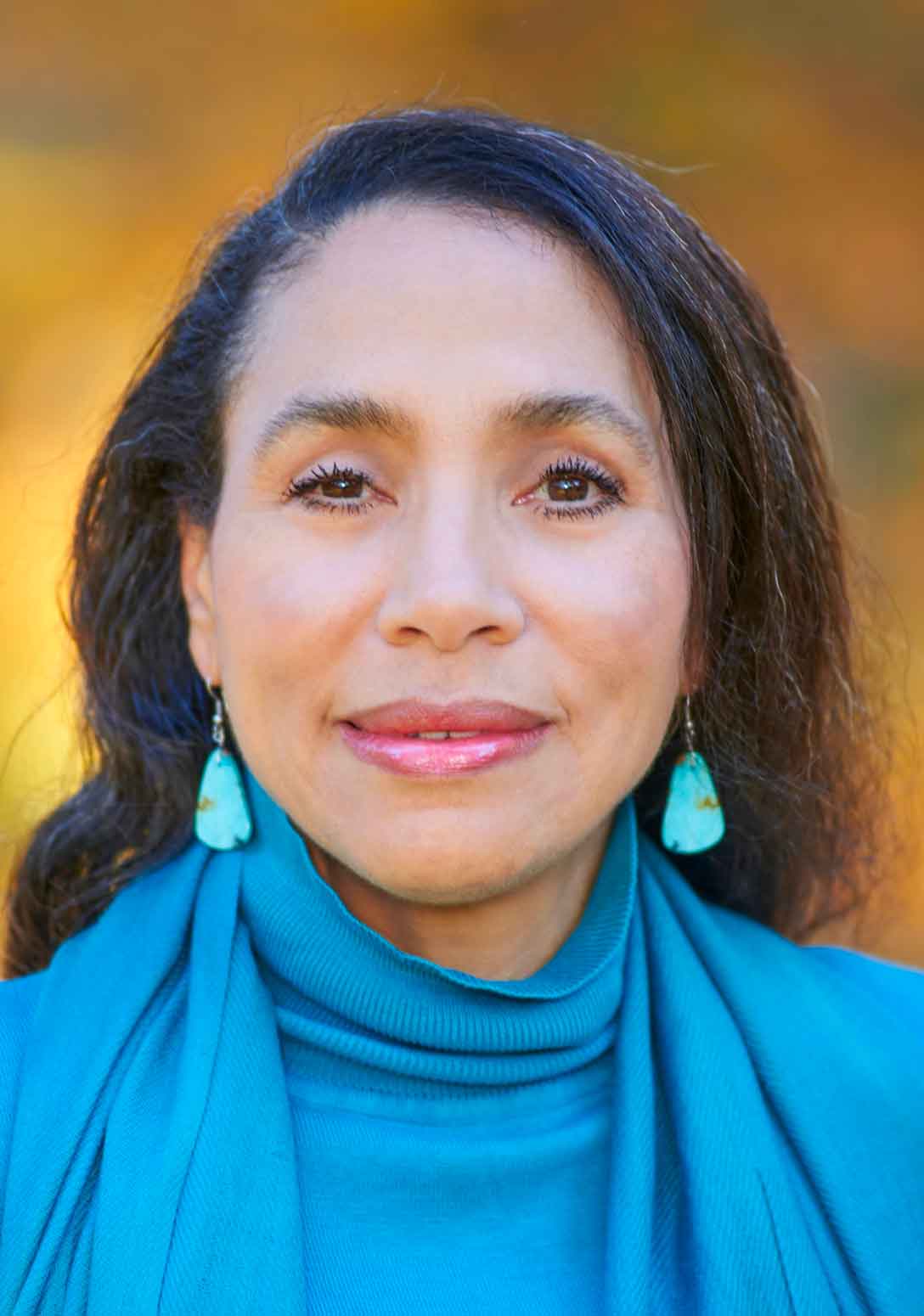 Headshot of Joan Henry.