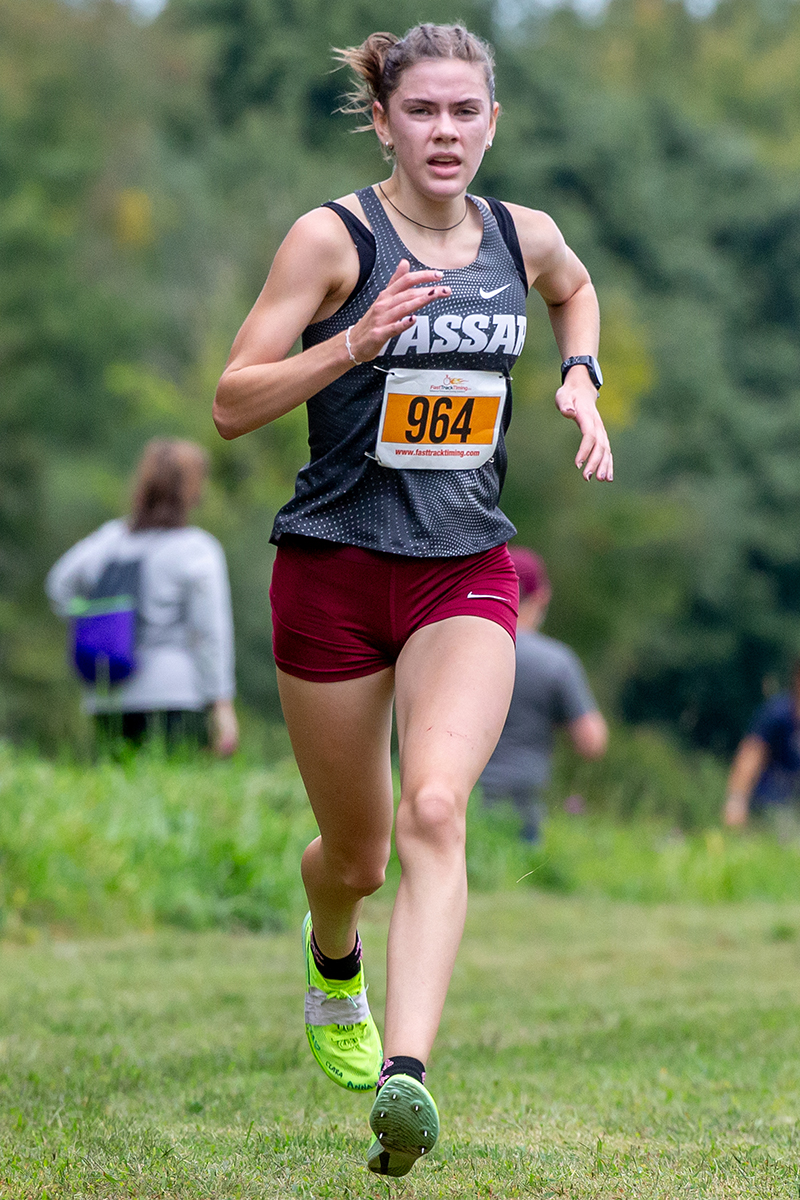 Haley Schoenegge runs in a race.