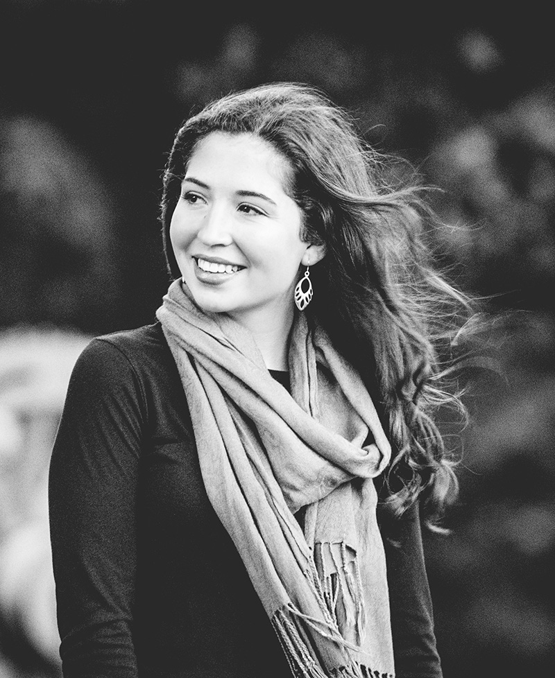 Black and white portrait of subject.