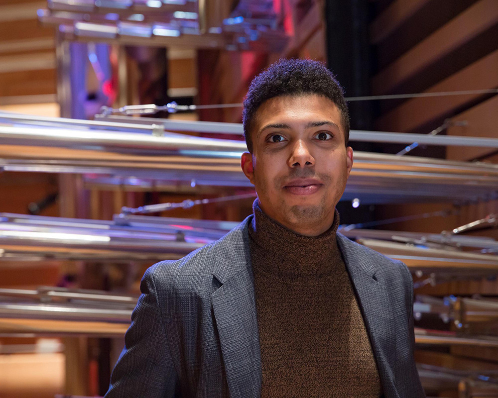 Subject smiling and looking directly at the camera.