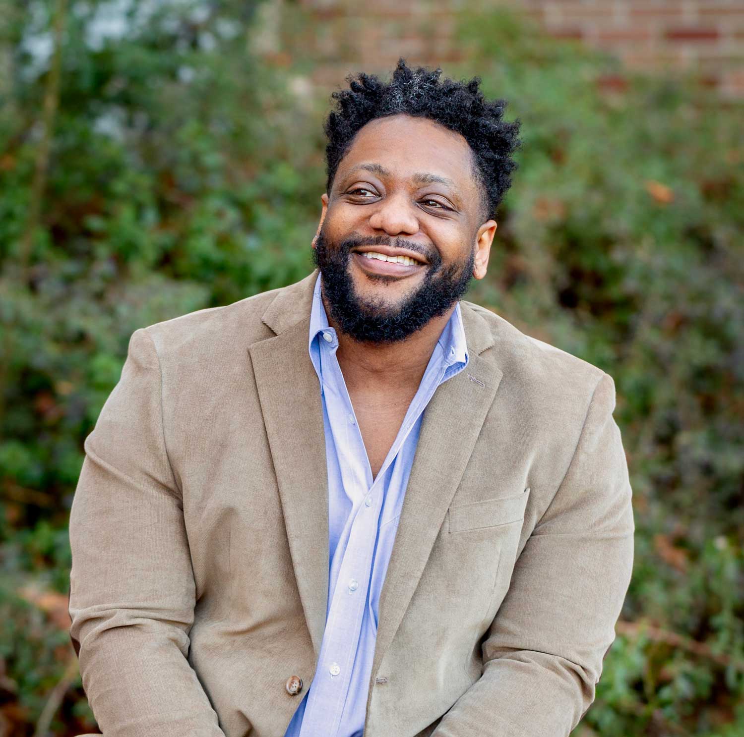 Headshot of Oliver Rollins.