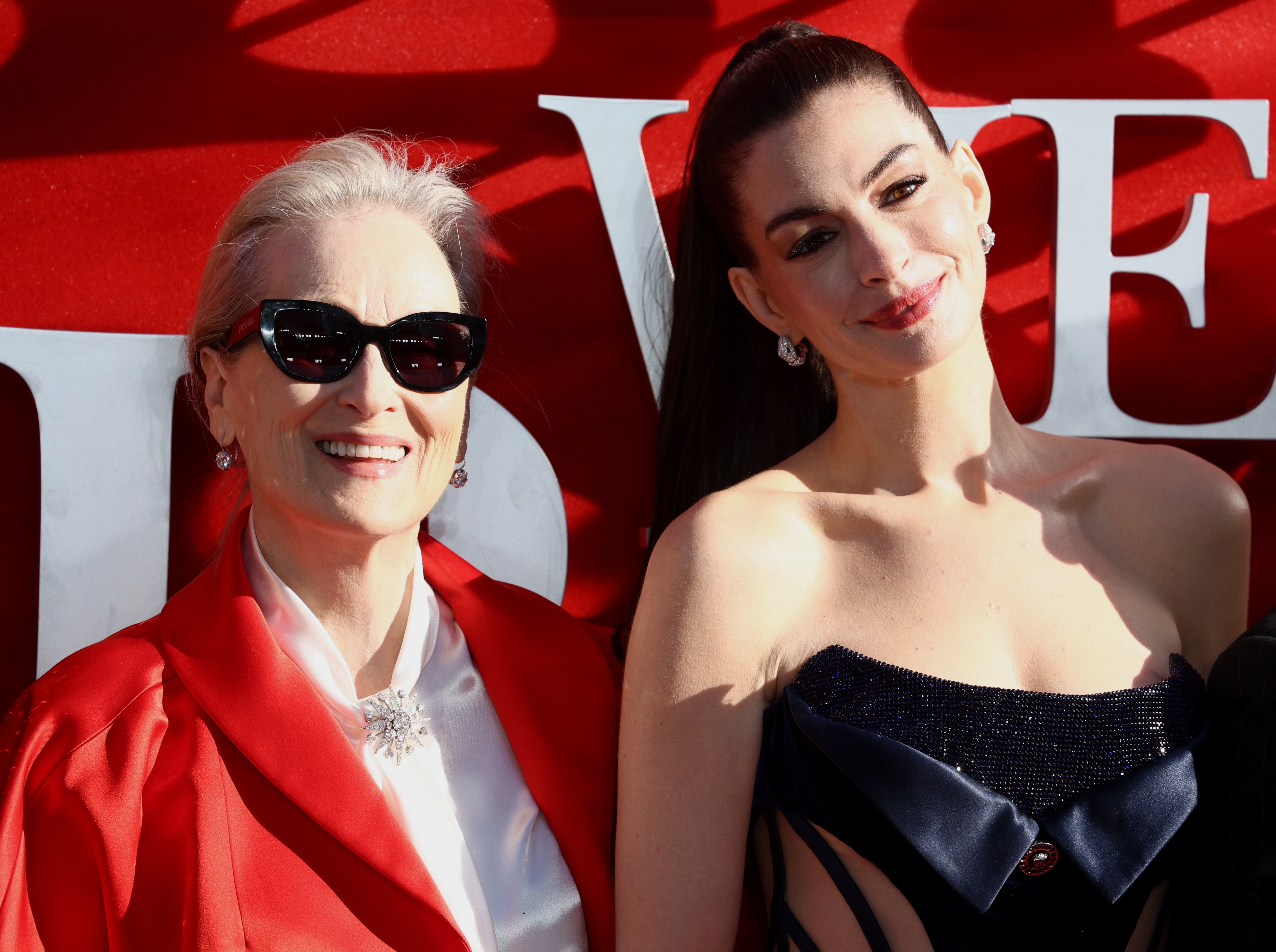 Meryl Streep and Anne Hathaway pose at the red carpet premier of Devil Wears Prada 2.