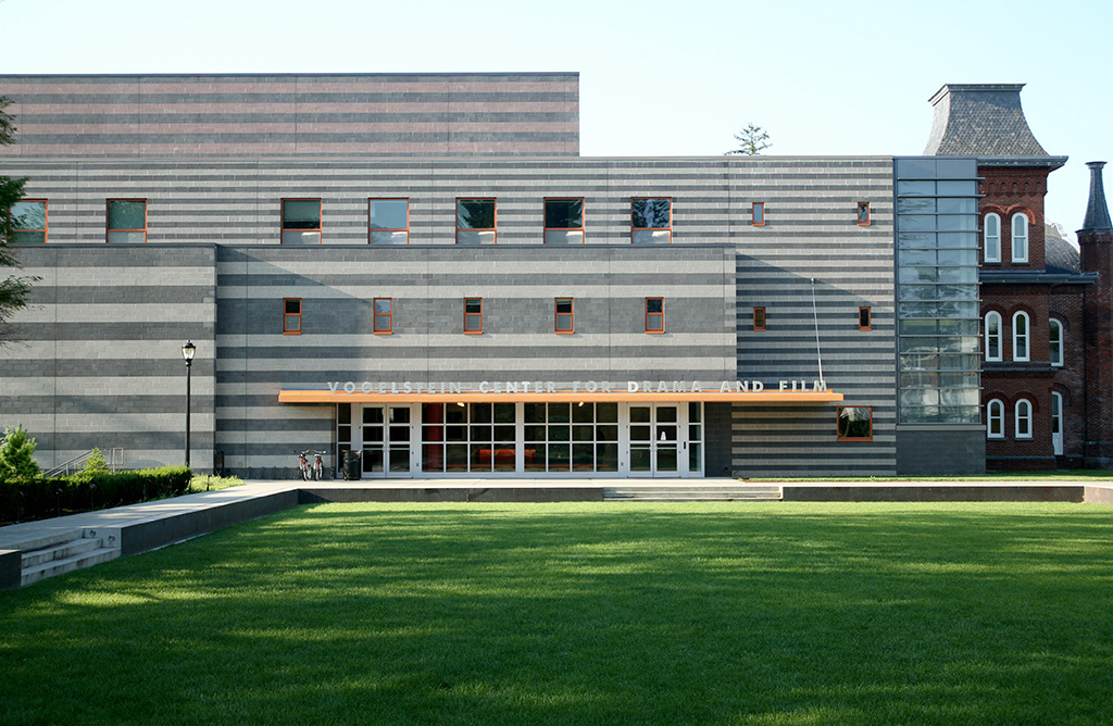 North entrance with a wide walkway and two accessible double doors.