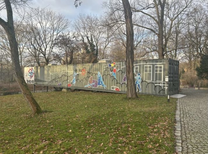 Shipping container with graffiti on it.
