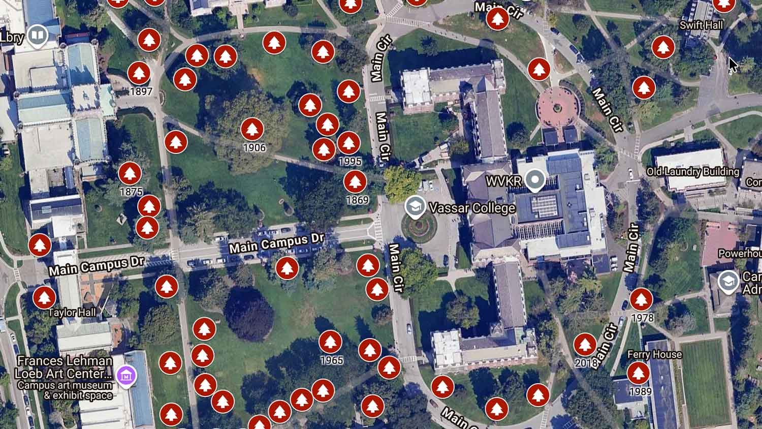 An overhead satellite view of a google map with markers.