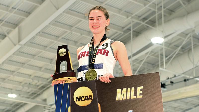 Athlete holding award