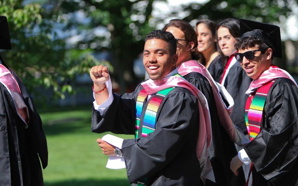 Students walk during Commencement