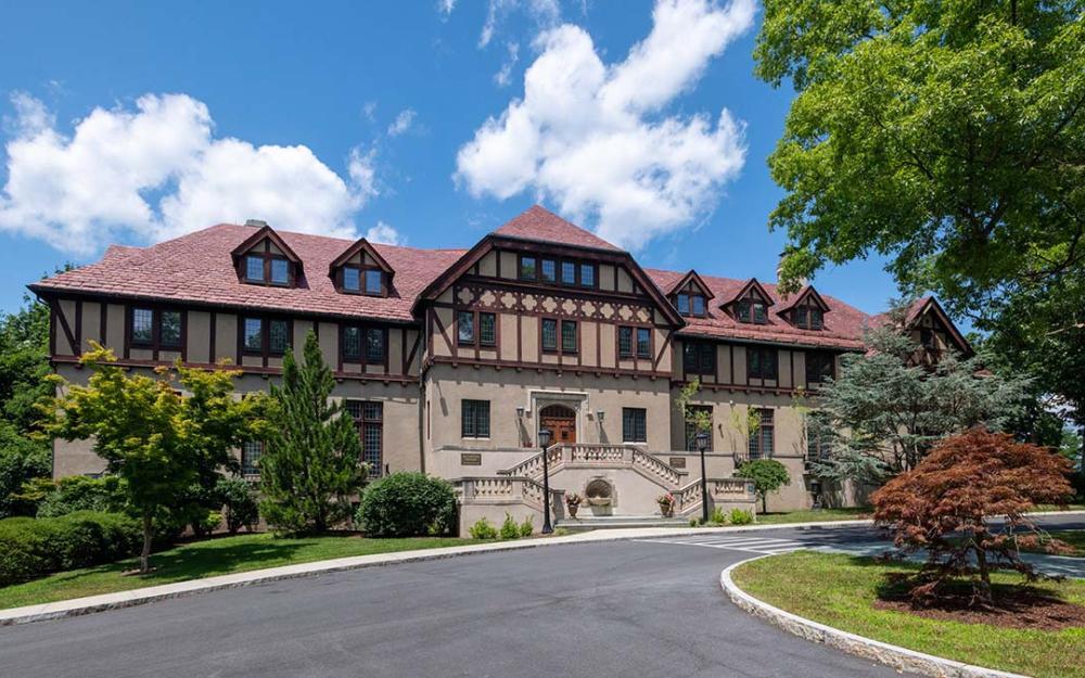 Exterior of Alumnae House in the Summer