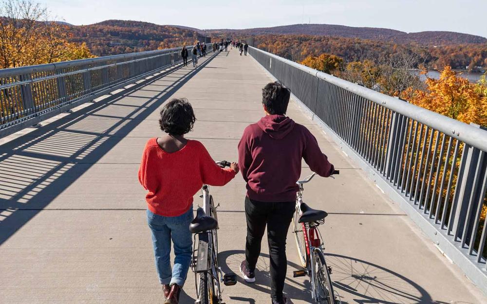 People walking with bikes on Walkway Over the Hudson
