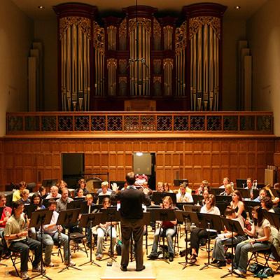 A wind ensemble performance conducted by James Osborn