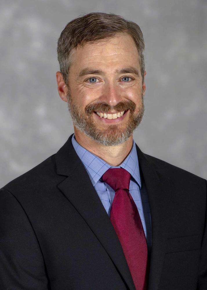 A portrait photo of James McCowan.