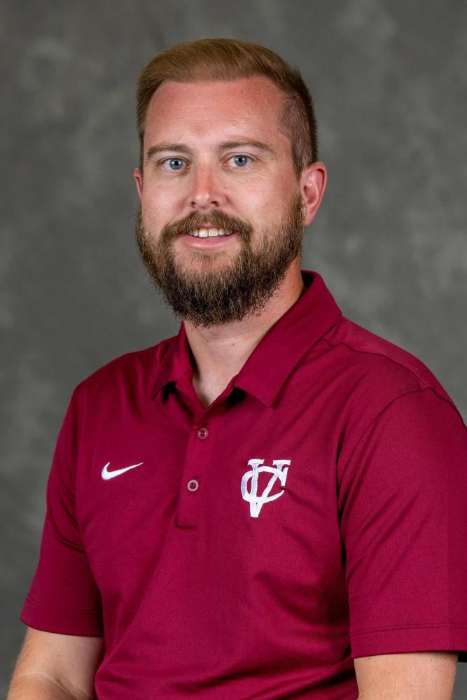 A portrait photo of Keith Simons.