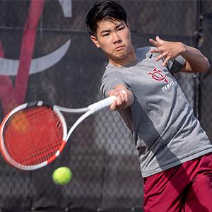 Action shot of Vassar tennis player Jay Wong ’24 