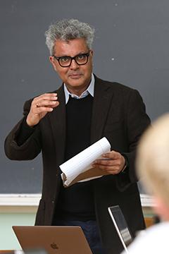 Professor Kumar teaching a class.