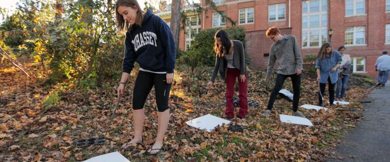 Students drawing outside