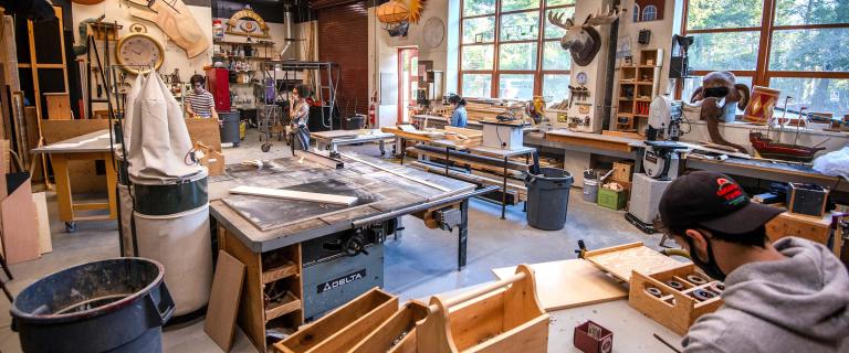 Working in the Scene Shop with James Hunting. Workstudy students preparing for upcoming set creations. Photo credit Parker Fairfield '24.