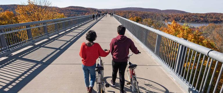 People walking with bikes on Walkway Over the Hudson