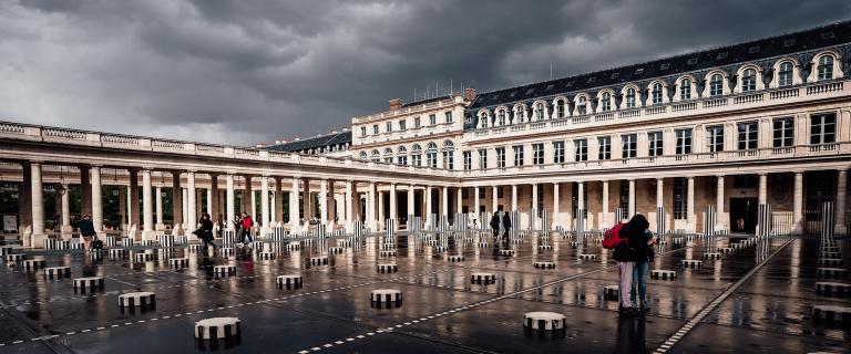 The Colonnes de Buren, and art installation situated in the inner courtyard of the Palais Royal. Paris, France.