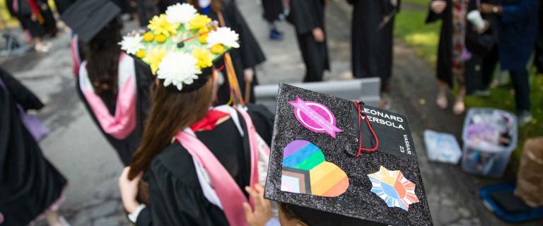 The top of two Decorated mortarboards