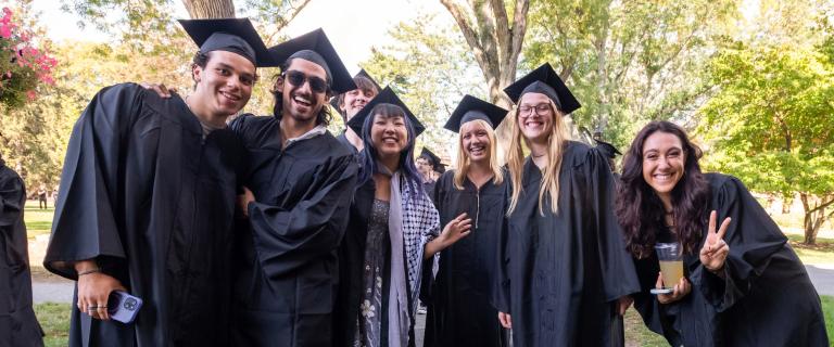 Group of convocation attendees smiling.